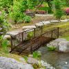 Outsunny 7' Metal Arch Garden Bridge with Safety Siderails, Decorative Arc Footbridge with Delicate Scrollwork "S" Motifs for Backyard Creek, Stream,